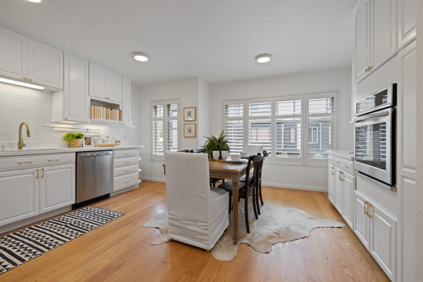 33 Park Road, Unit 3 Burlingame, CA 94010 - Photo 1 of 28 a view of kitchen with dining table and chairs