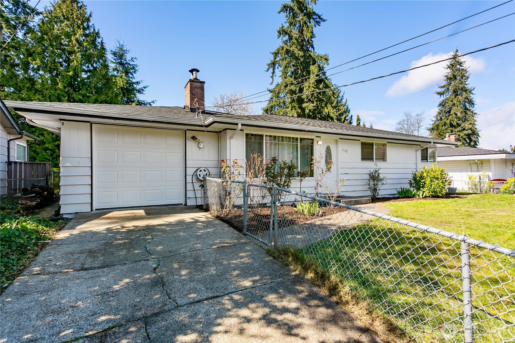 31327 12th Place South Federal Way, WA 98003 - Photo 25 of 40 a front view of a house with patio