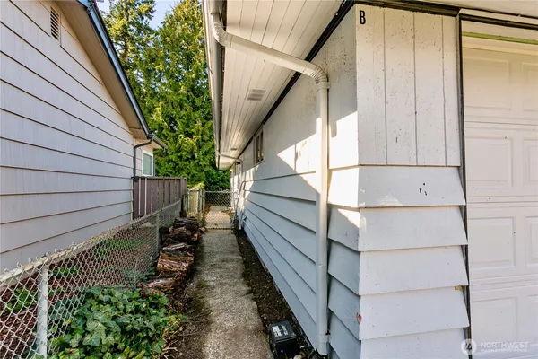 a view of house with wooden stairs