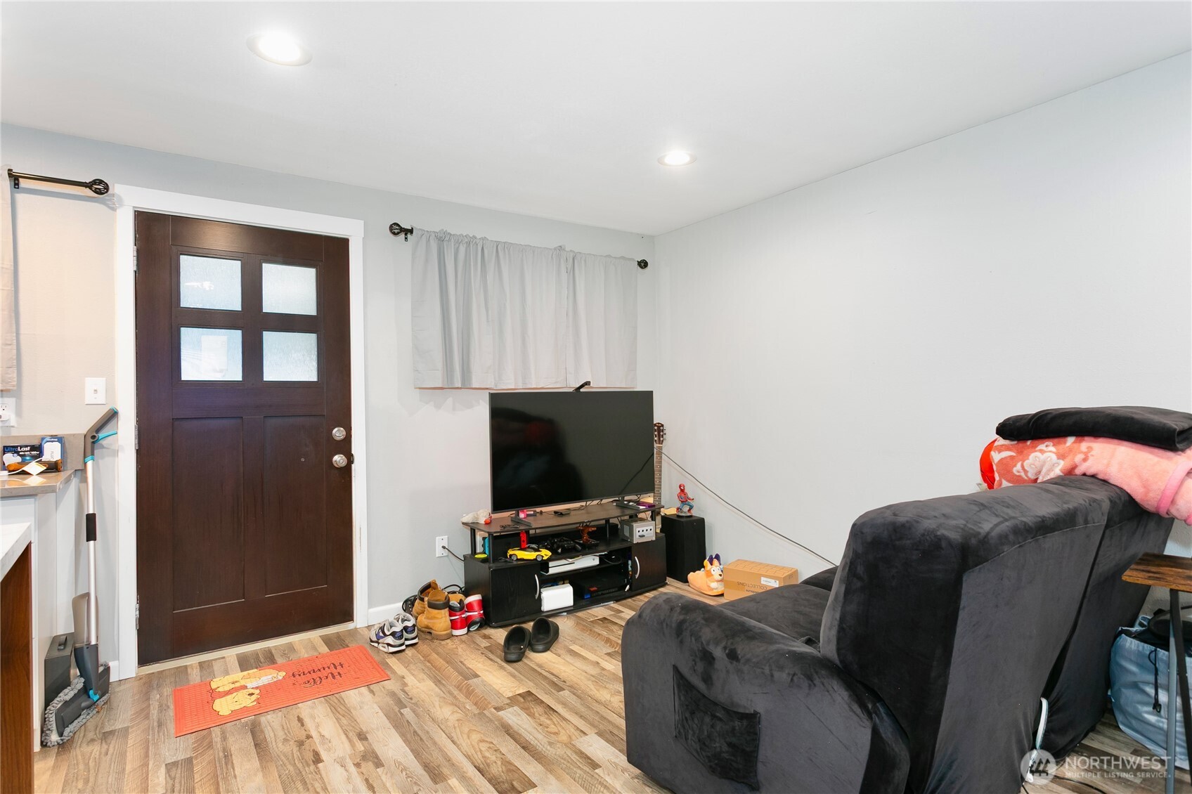 31327 12th Place South Federal Way, WA 98003 - Photo 29 of 40 a bedroom with furniture and a flat screen tv