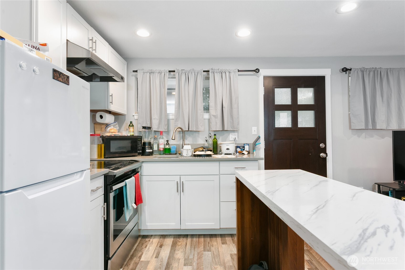31327 12th Place South Federal Way, WA 98003 - Photo 31 of 40 a kitchen with a sink appliances and cabinets