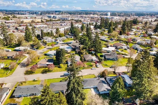an aerial view of residential building and parking space