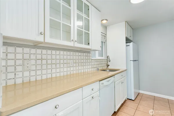 a bathroom with a sink and a shower
