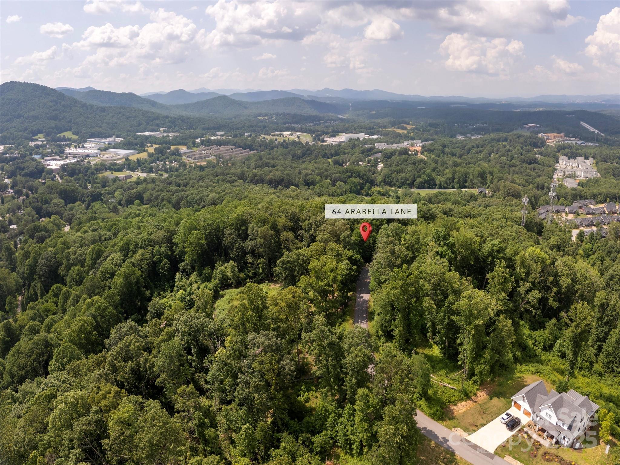 64 Arabella Lane Arden, NC 28704 - Photo 3 of 11 an aerial view of residential houses with outdoor space and trees