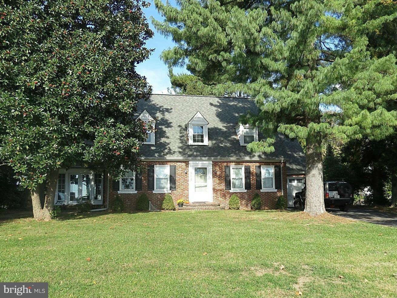 502 North Main Street Mount Airy, MD 21771 - Photo 1 of 27 a front view of a house with a garden