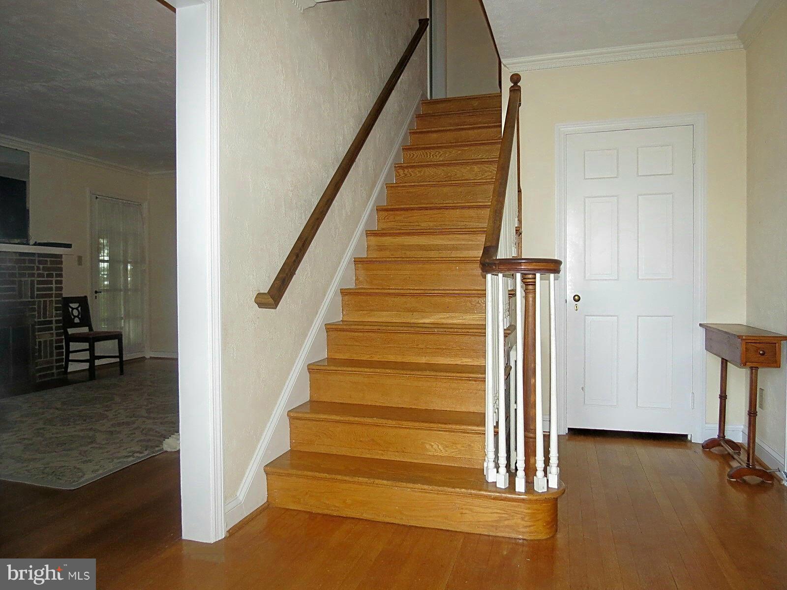 502 North Main Street Mount Airy, MD 21771 - Photo 2 of 27 a view of entryway and hall with wooden floor