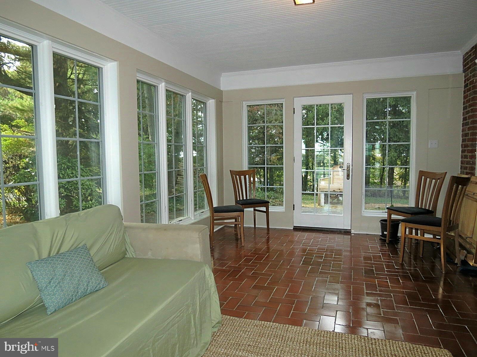 502 North Main Street Mount Airy, MD 21771 - Photo 13 of 27 a living room with furniture and a large window