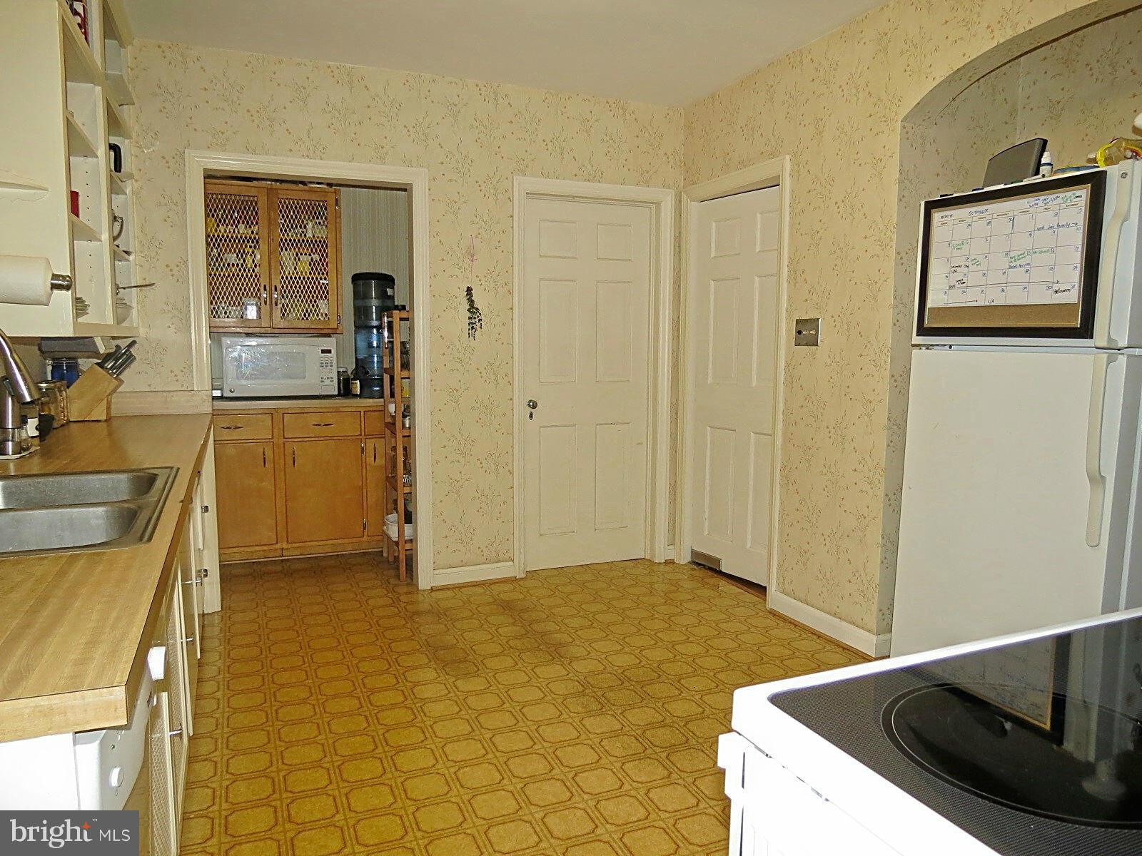 502 North Main Street Mount Airy, MD 21771 - Photo 14 of 27 a view of a kitchen cabinets and wooden floor