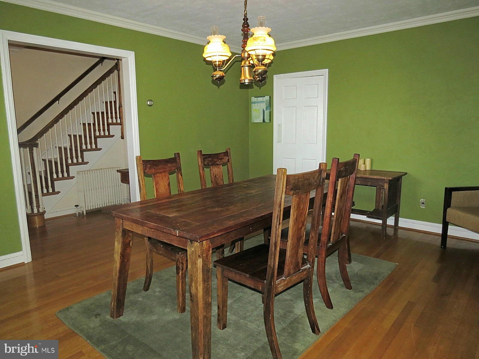 502 North Main Street Mount Airy, MD 21771 - Photo 4 of 27 a view of a dining room with furniture and wooden floor