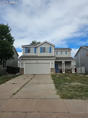 front view of house with a yard