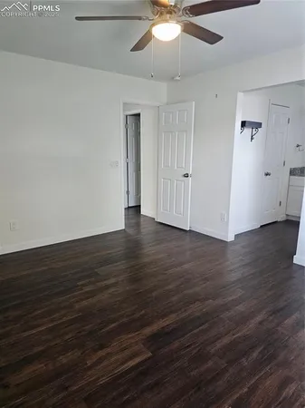 a view of a livingroom with wooden floor