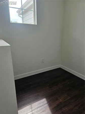 an empty room with cabinet