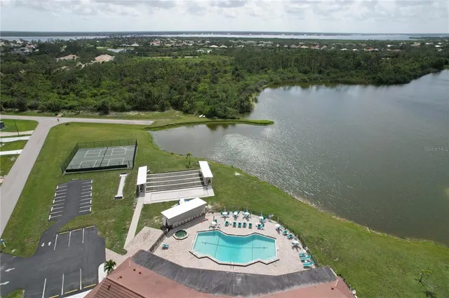 a view of a terrace with couches and city view