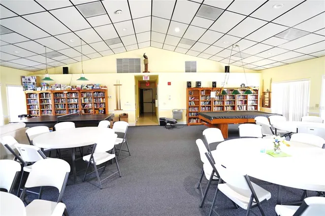 a view of a lake with boats and trees