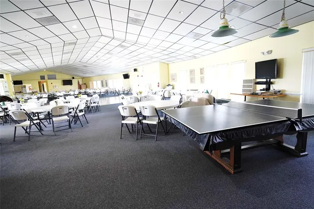 a view of swimming pool from a balcony