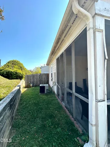 a view of a porch with a yard