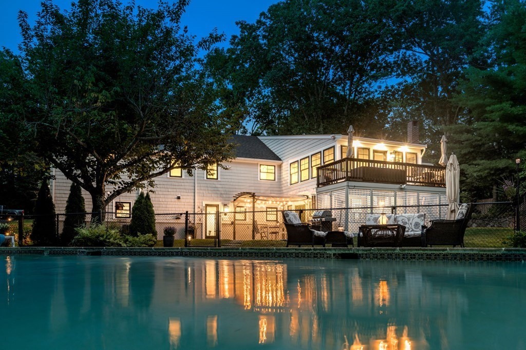 39 Bradyll Road Weston, MA 02493 - Photo 11 of 11 a front view of a house with a lake view