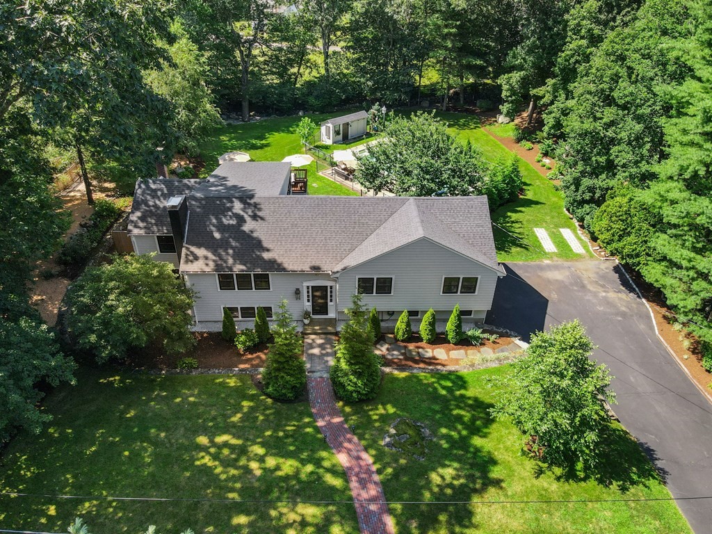 39 Bradyll Road Weston, MA 02493 - Photo 2 of 11 an aerial view of a house with yard swimming pool and outdoor seating