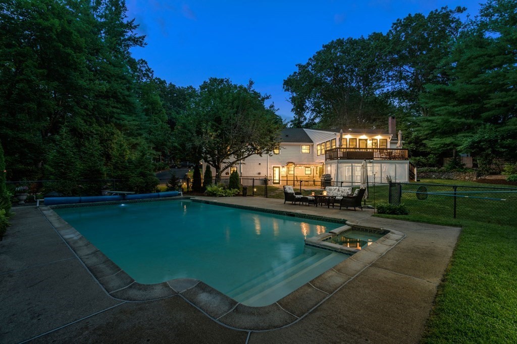 39 Bradyll Road Weston, MA 02493 - Photo 9 of 11 an aerial view of a house with swimming pool garden and patio