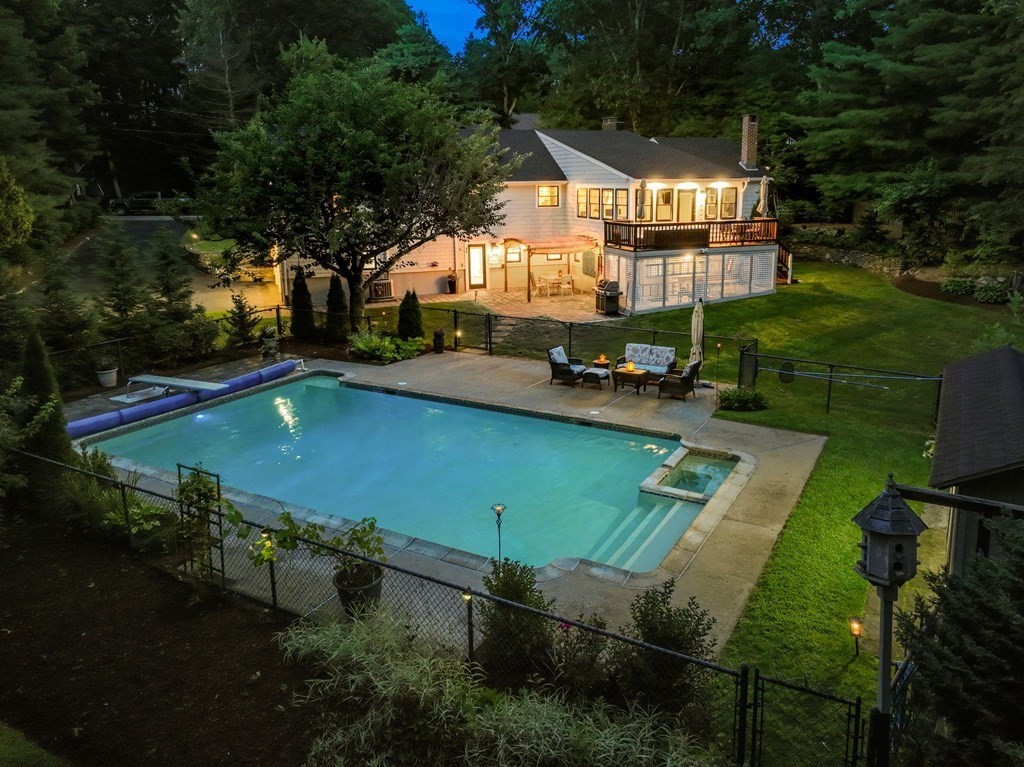 39 Bradyll Road Weston, MA 02493 - Photo 10 of 11 an aerial view of a house with swimming pool garden and patio