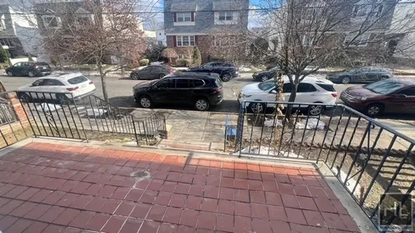 a view of street with sitting area