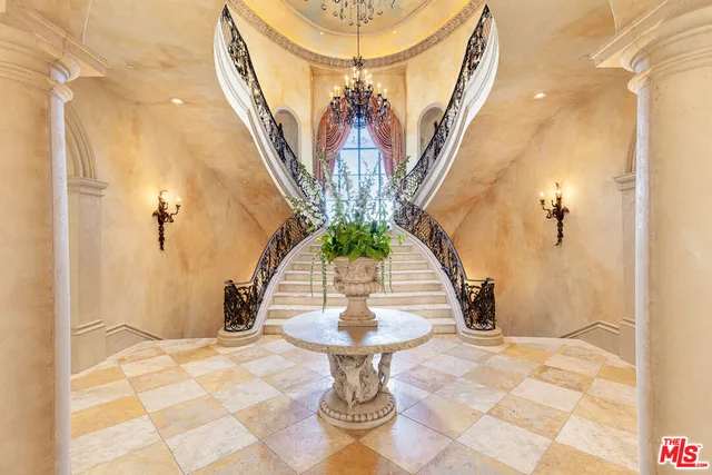 a vase of flowers sitting on a table