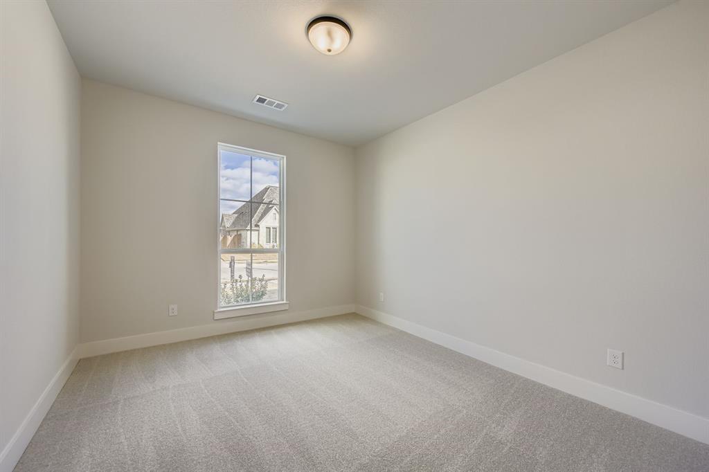 4446 Timberdrift Street Midlothian, TX 76065 - Photo 20 of 28 an empty room with windows