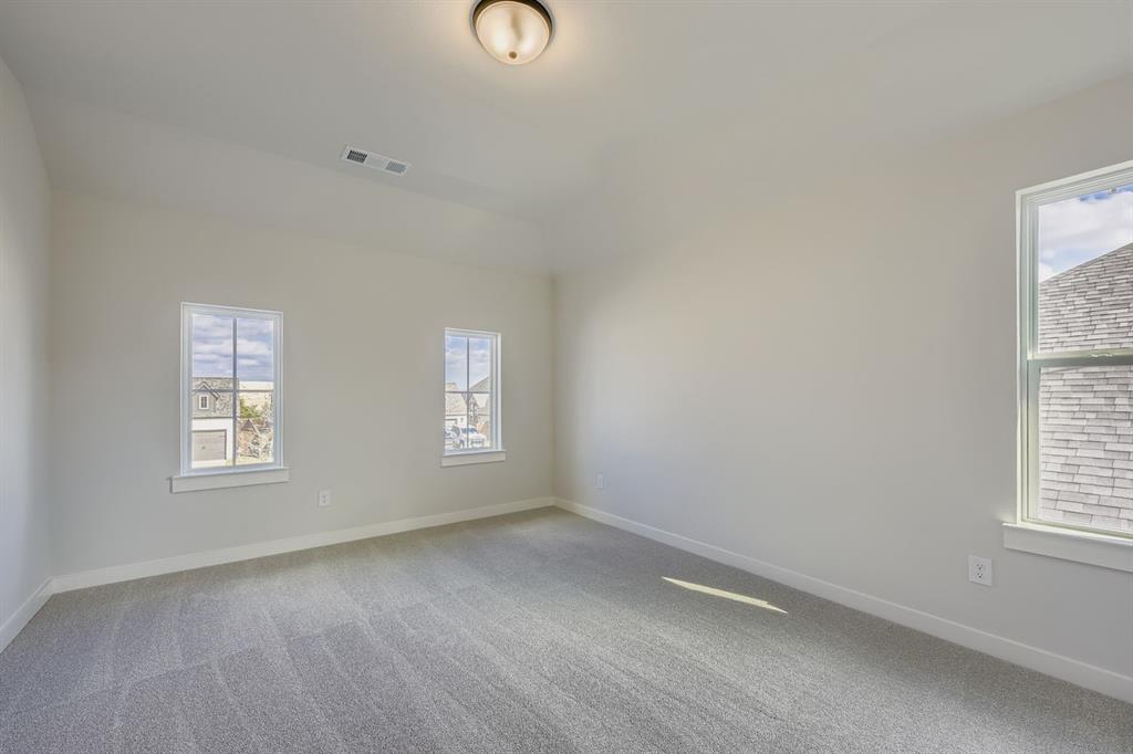4446 Timberdrift Street Midlothian, TX 76065 - Photo 22 of 28 an empty room with windows