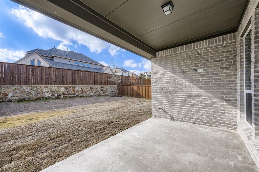 4446 Timberdrift Street Midlothian, TX 76065 - Photo 27 of 28 a view of a backyard