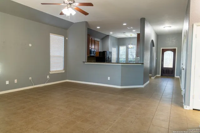 an open space with kitchen view and living room