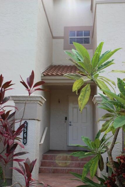 6560 Via Regina Boca Raton, FL 33433 - Photo 11 of 15 a vase of flowers sitting on a table