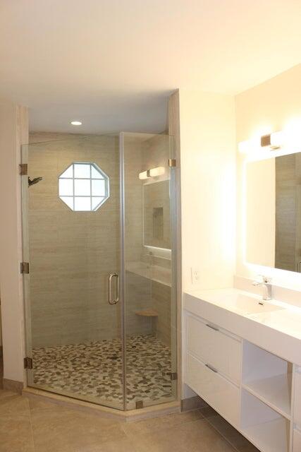 6560 Via Regina Boca Raton, FL 33433 - Photo 5 of 15 a bathroom with shower