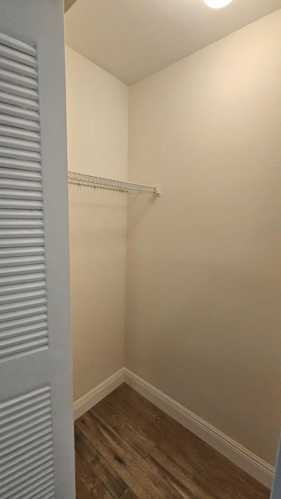 6560 Via Regina Boca Raton, FL 33433 - Photo 9 of 15 a view of small space with racks on the wall