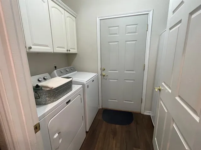 a bathroom with a sink toilet and tub