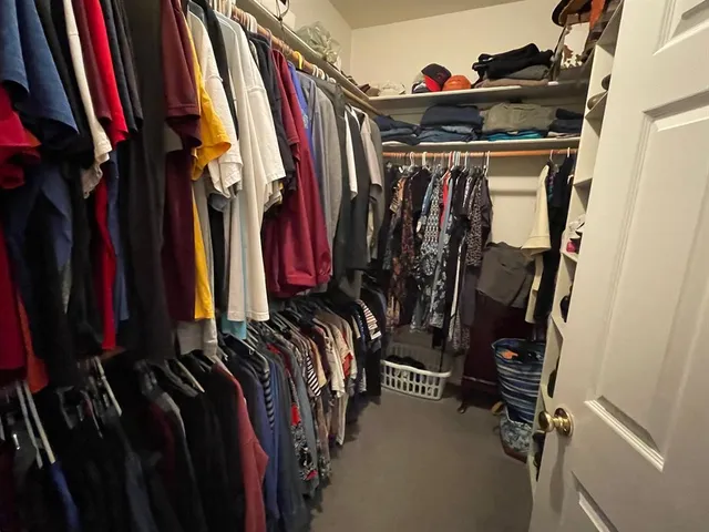 a view of workspace with wooden floor entryway