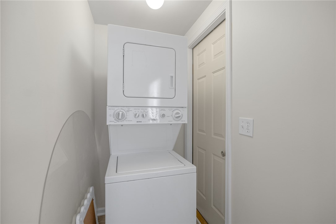1230 Melton Road, Unit 25 West Union, SC 29696 - Photo 29 of 46 Conveniently located laundry space includes a stacked washer and dryer unit.