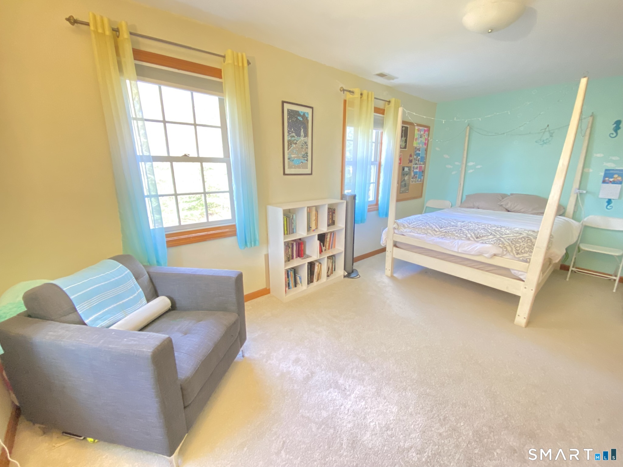 12 Carriage Hill Road Woodbridge, CT 06525 - Photo 18 of 24 a bedroom with furniture and a window