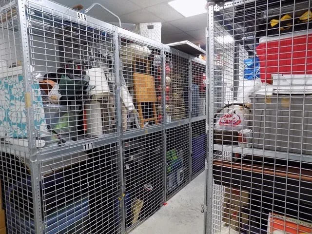 a bathroom with a sink toilet shower and shower