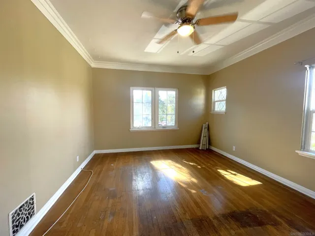 a view of an empty room and window