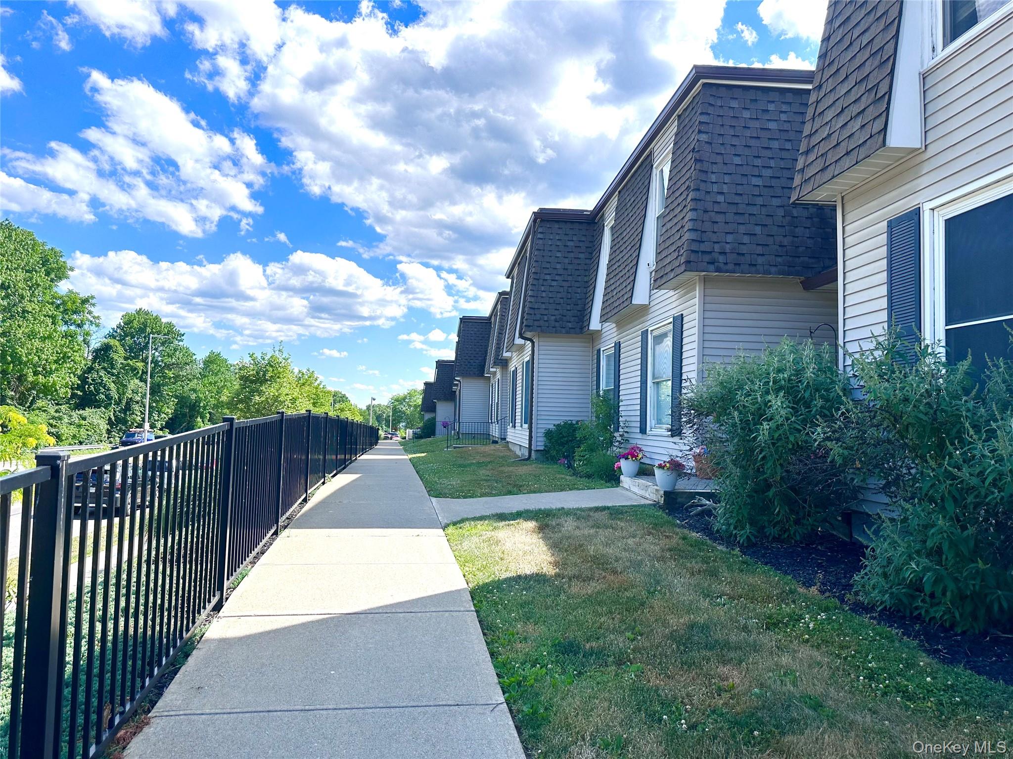 150 Rinaldi Boulevard, Unit A Poughkeepsie, NY 12601 - Photo 1 of 34 Elevated walkway to your new home!