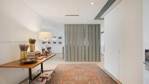 a view of a workspace with furniture