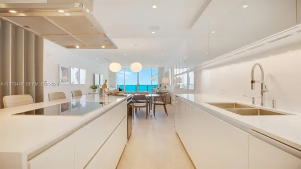 a very nice looking kitchen with a large counter space