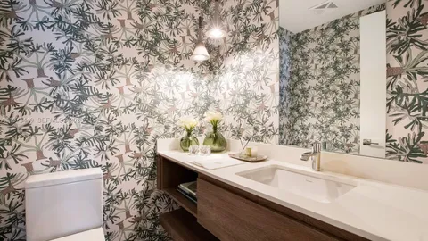 a bathroom with a sink and a toilet