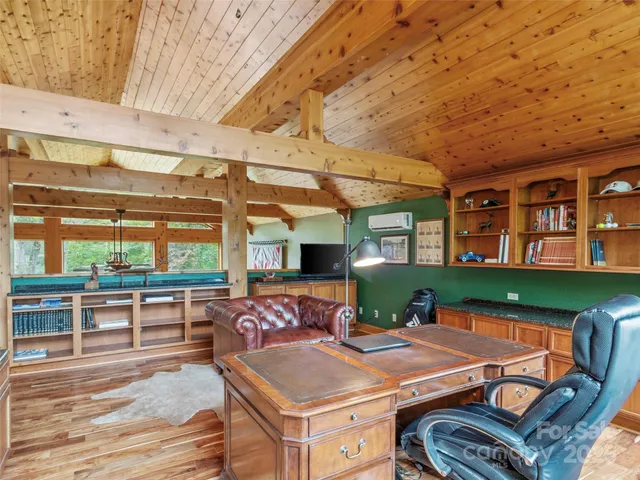 a view of a patio with a table and chairs