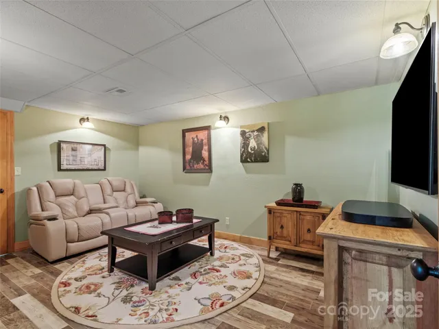 a living room with a couch and a flat screen tv