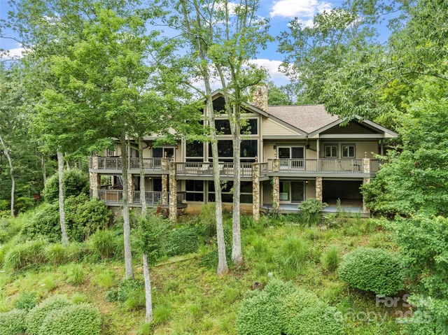 a house with trees in the background
