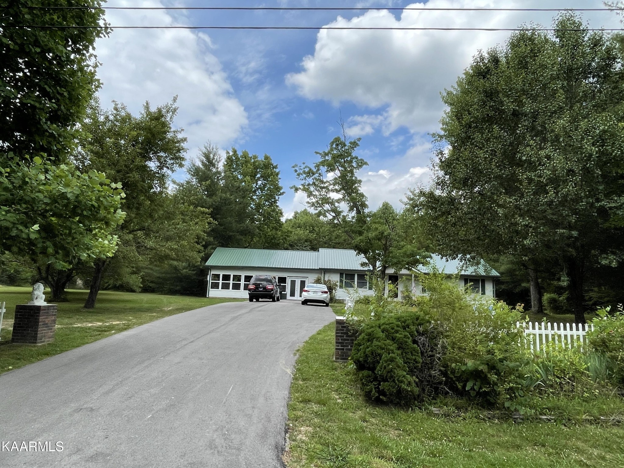 330 Deerfield Road Sparta, TN 38583 - Photo 3 of 32 a view of house with outdoor space and garden
