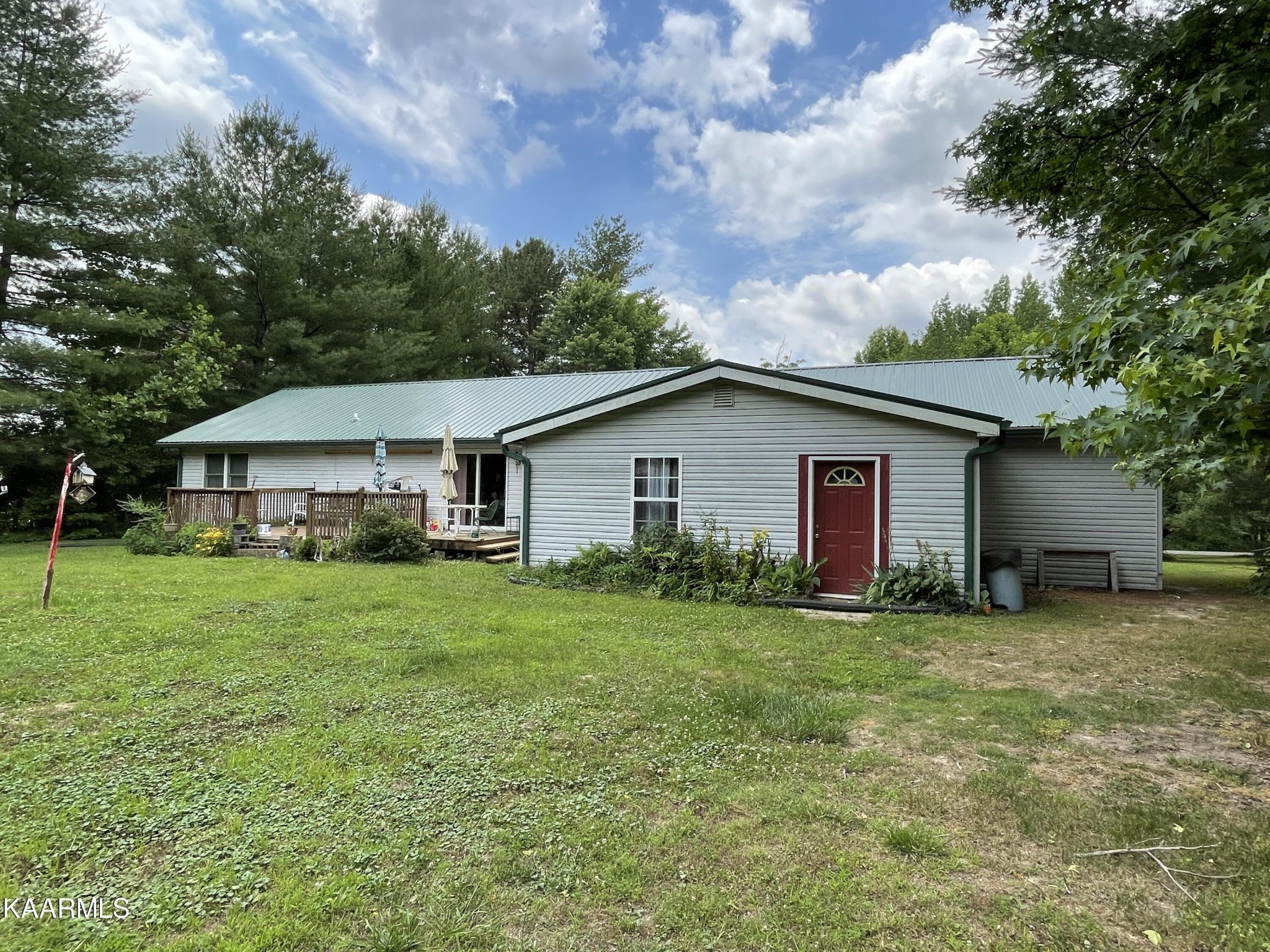 330 Deerfield Road Sparta, TN 38583 - Photo 9 of 32 a view of a house with a yard