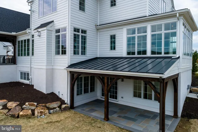 a view of a house with a roof deck