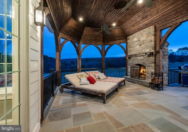 a aerial view of a house with a yard